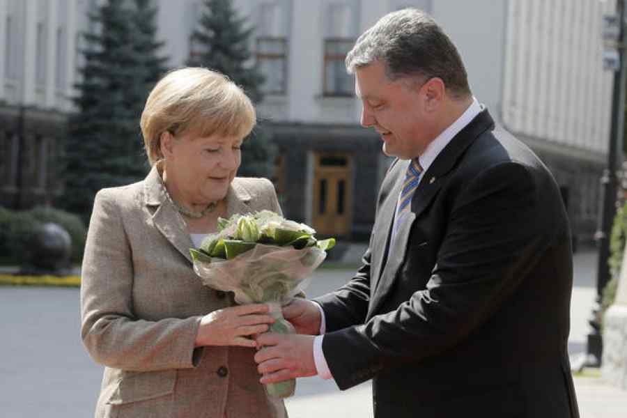 Ce a vrut şi ce a obţinut Poroşenko de la Angela Merkel