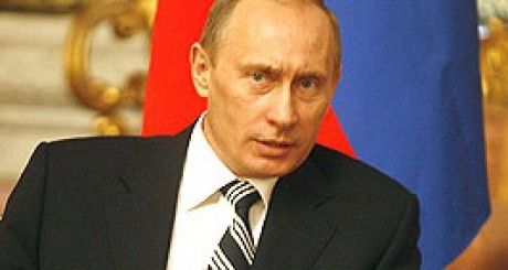 Putin: Washingtonul „se comportă ca un huligan” prin inundarea pieţei cu dolari devalorizaţi