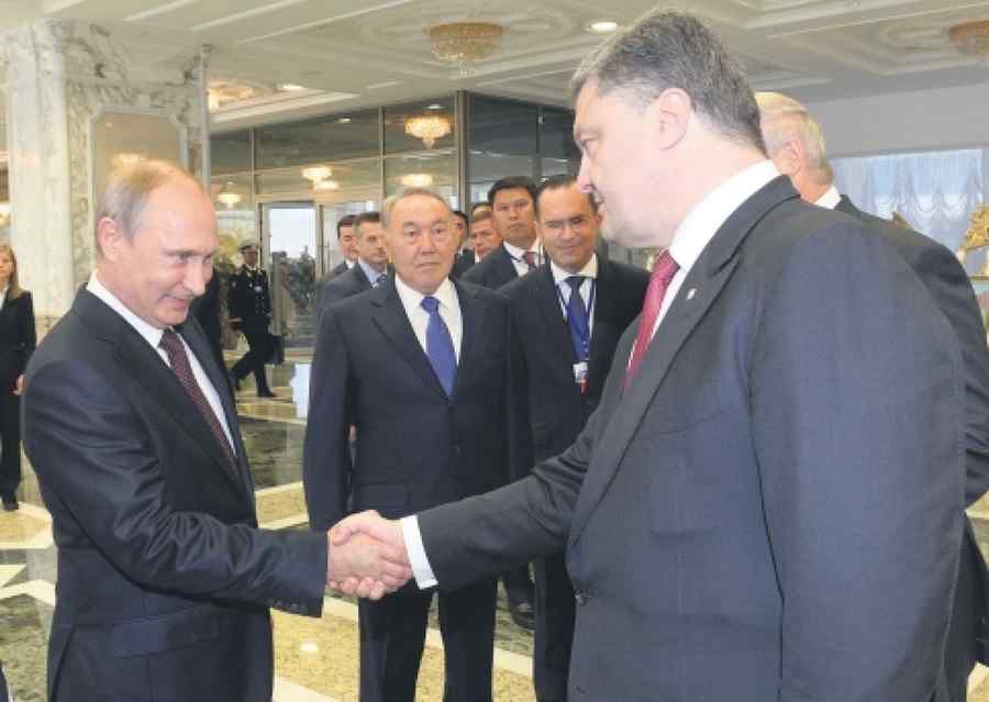 Concluziile lui Putin și Poroșenko după câteva ore de armistițiu