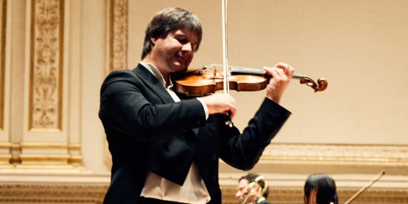 Dirijorul Christian Badea și violonistul Liviu Prunaru, în deschiderea stagiunii