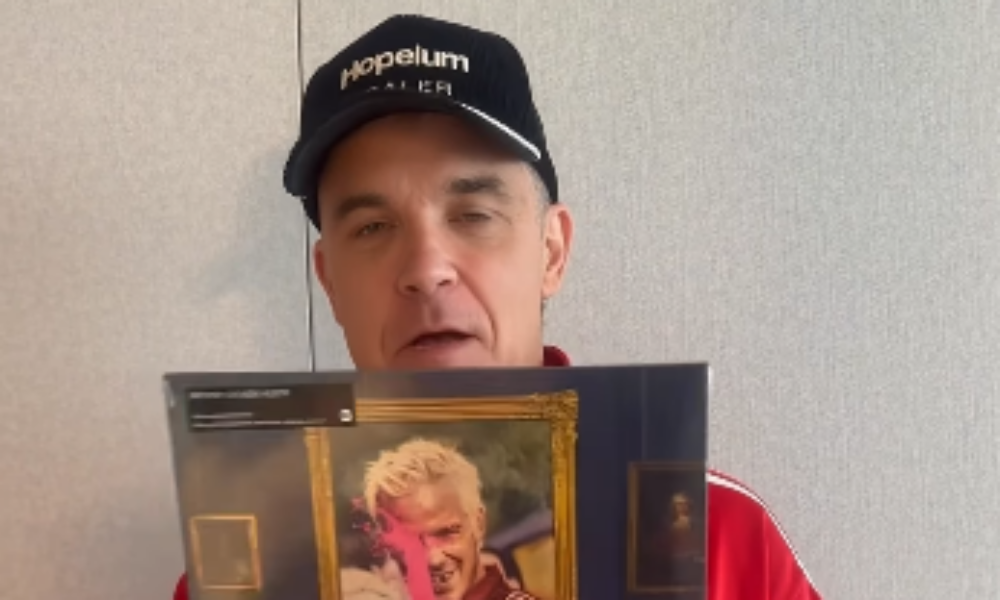 Robbie Williams bate un record deținut de The Beatles