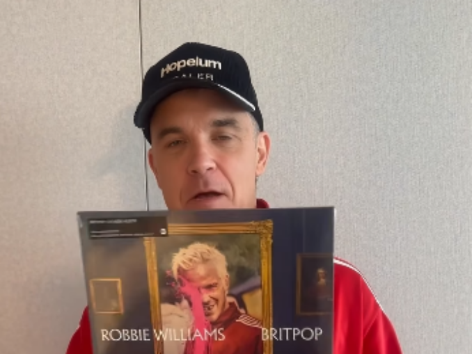 Robbie Williams bate un record deținut de The Beatles