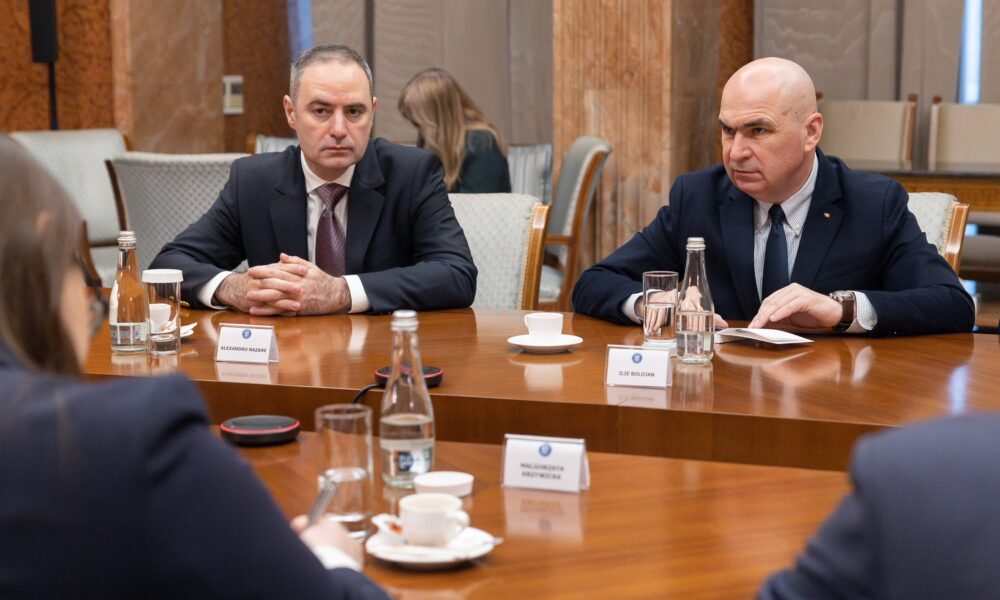 Guvernul caută un rating de țară mai bun. Ce au discutat Bolojan și Nazare cu Fitch