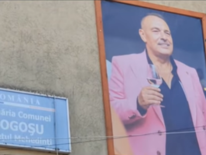 Edil decedat, imortalizat pe primărie cu vinul în mână