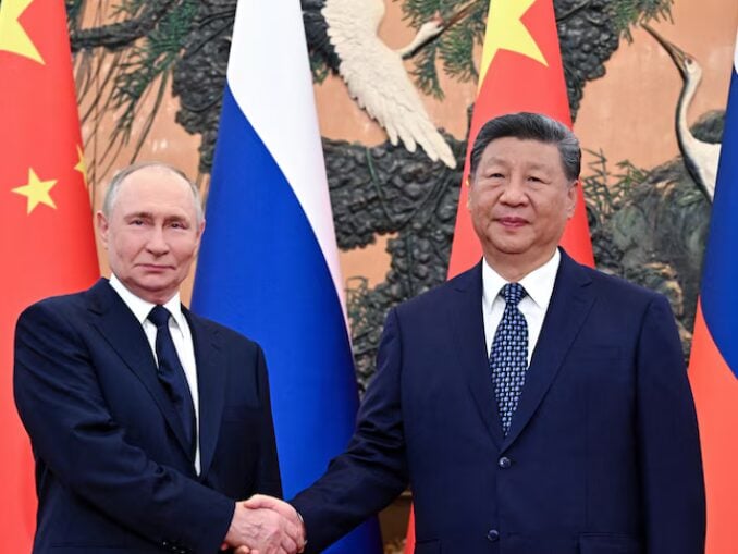Putin se duce la Beijing imediat după vizita lui Trump
