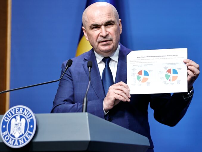 România dă pe salariile bugetarilor mai mult decât media UE, dar încasează la buget mai puțin. Soluțiile lui Bolojan: creșteri de salarii modeste sau concedieri